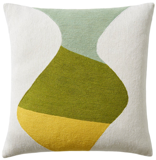 Decorative pillow with abstract design in green and yellow on a white background